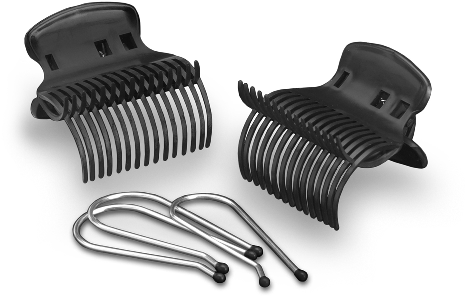 Two black hair roller clips and three silver bobby pins on a white surface.