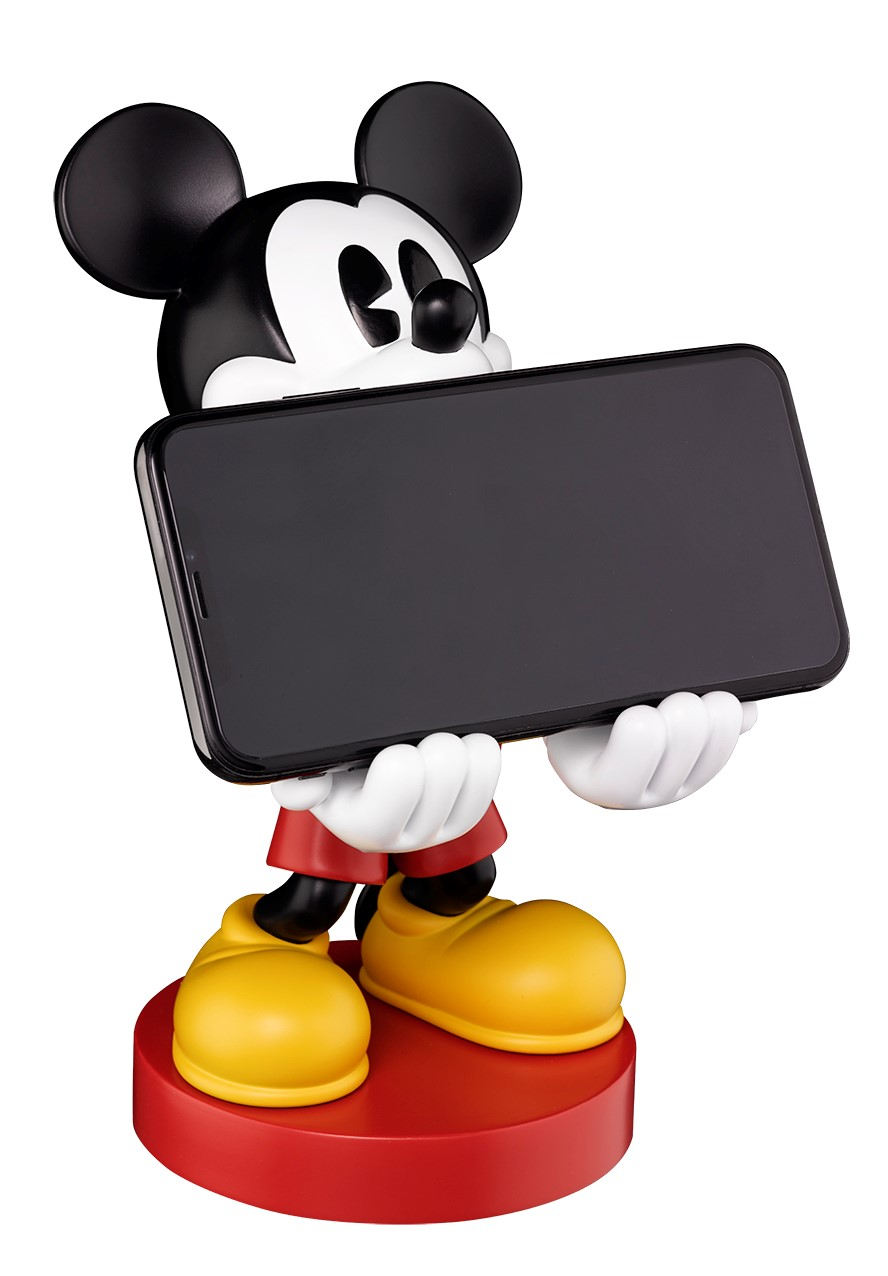 Mickey Mouse Figur, die ein Smartphone mit schwarzem Bildschirm auf roter Basis hält.