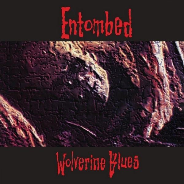 Albumcover. Dunkles Bild mit Text Entombed Wolverine Blues in Rot und Weiß.