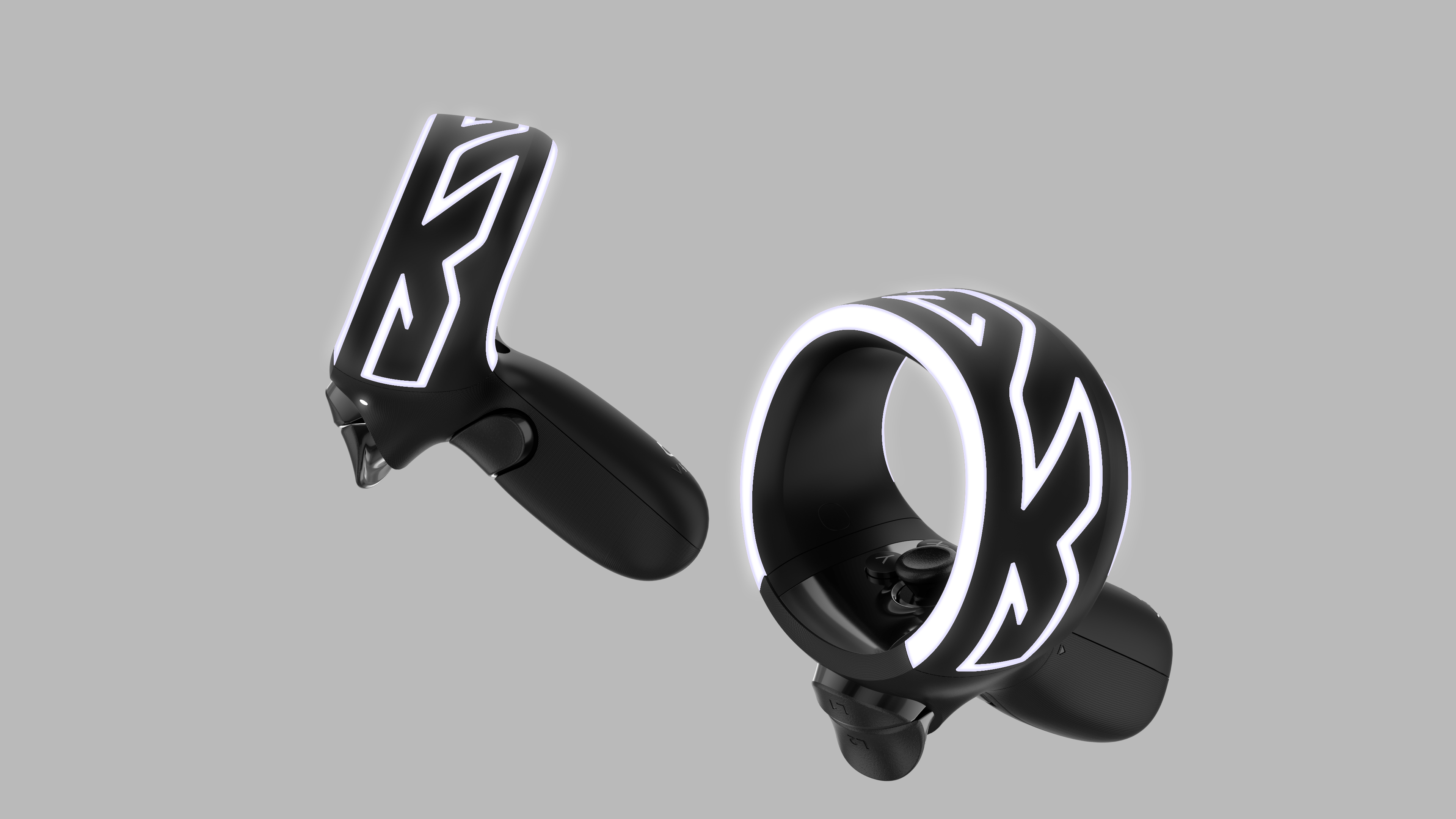 Zwei schwarz-weiße VR-Controller, einer mit Ringdesign, der andere mit Griff.