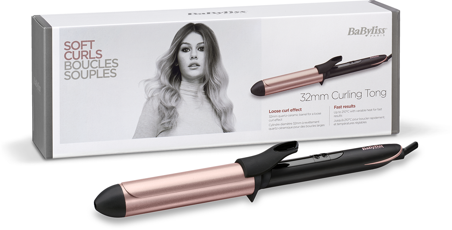 Box with curling iron, black and rose gold. Image of woman's hair on the box.