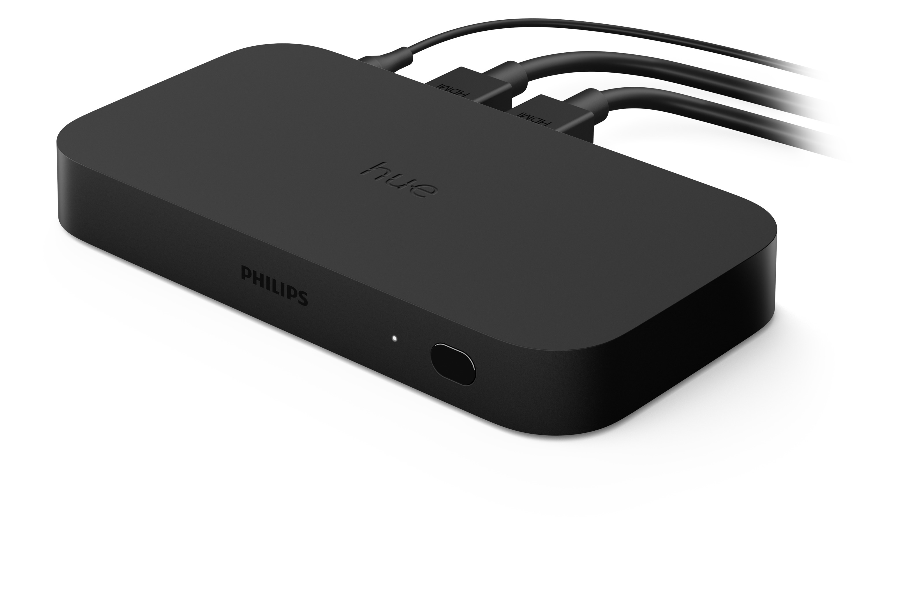 Schwarzes Philips Hue Gerät mit drei angeschlossenen Kabeln auf weißem Grund.