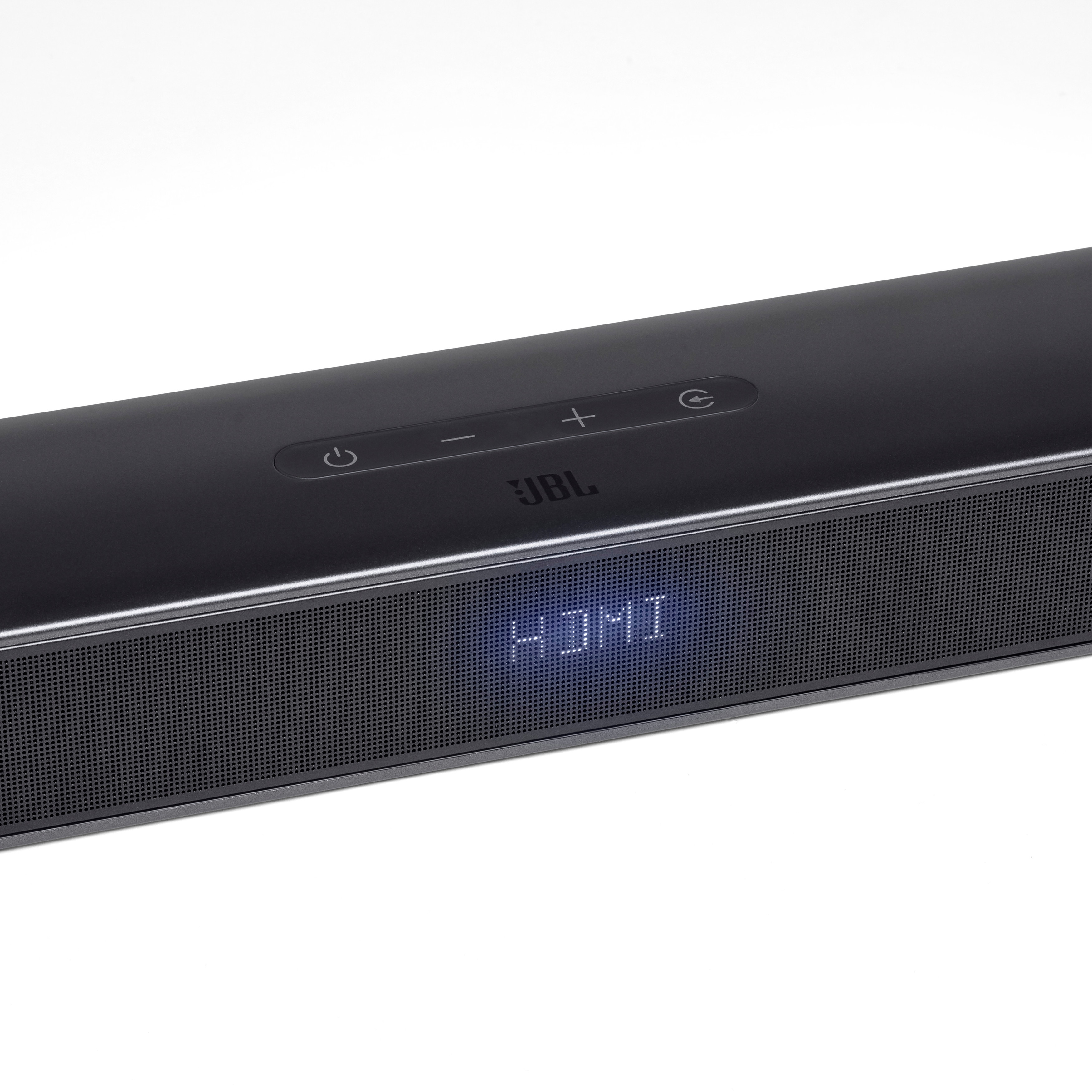 Eine schwarze JBL Soundbar mit beleuchtetem HDMI-Label.