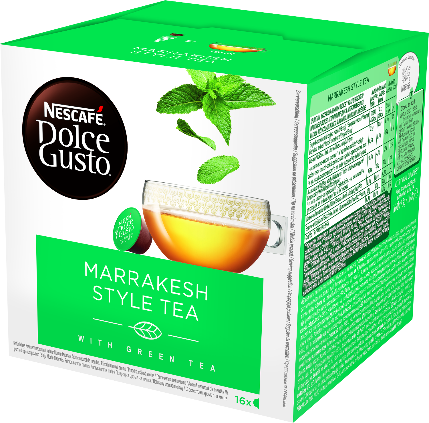 Boîte verte de thé Dolce Gusto avec une tasse en verre et feuilles de menthe. Fond blanc.