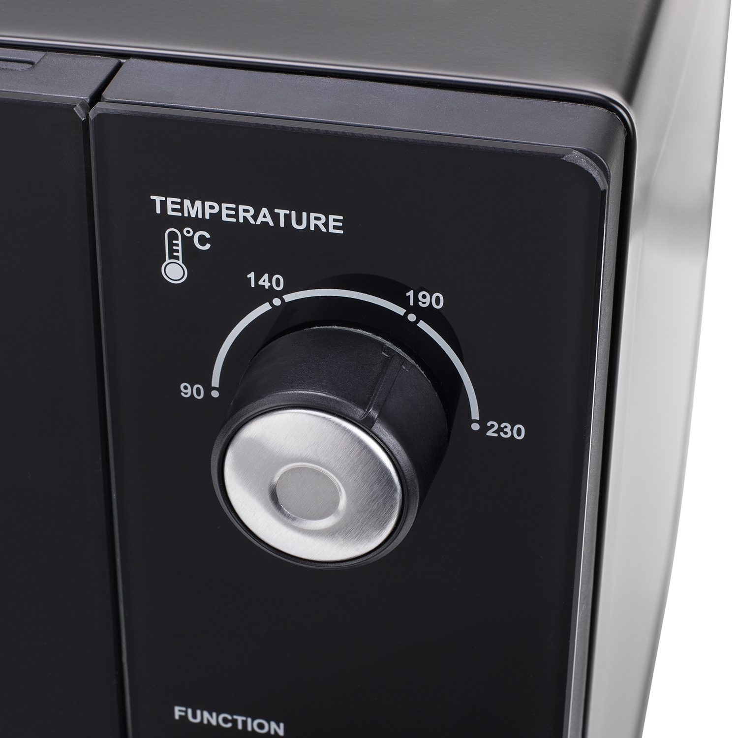 Close-up van een zwart bedieningspaneel van een magnetron met temperatuurknop.