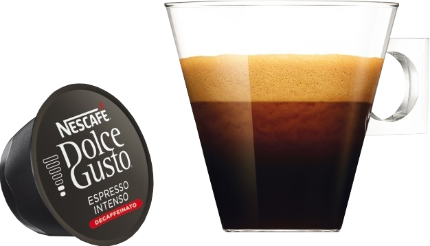 Tazza di caffè piena di caffè e una capsula di caffè sul lato sinistro. Caffè decaffeinato.