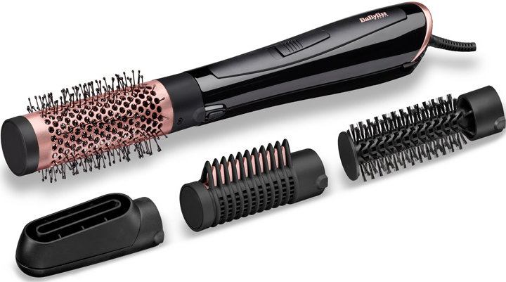 Une brosse à coiffer noire et or rose avec des têtes amovibles.