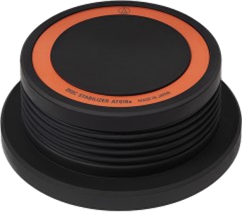 Zwarte schijfstabilisator met een oranje ring bovenop. De tekst 'schijfstabilisator' is zichtbaar.