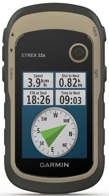 A Garmin GPS device with a screen showing speed, distance, ETA, and time. It has a compass.