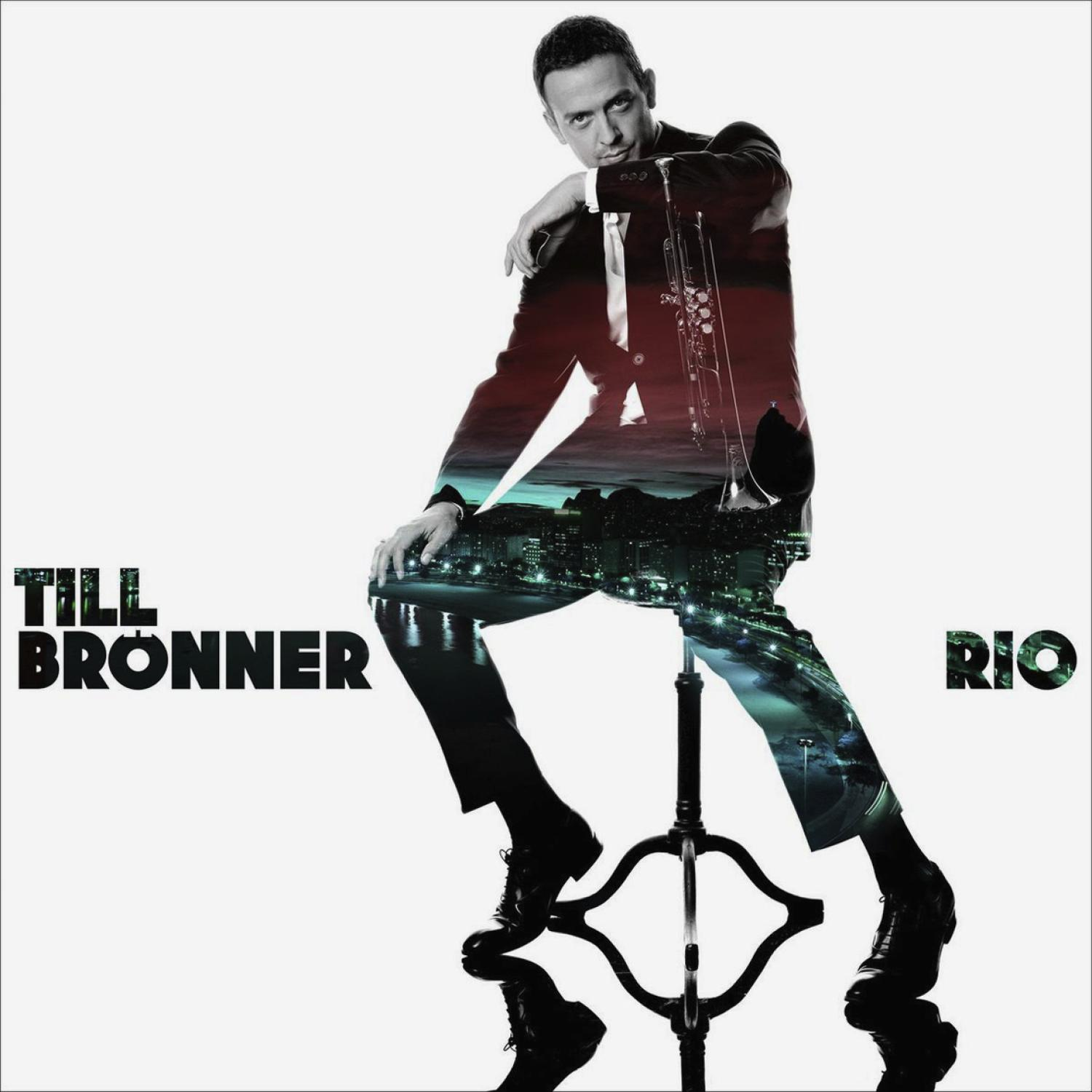 Albumcover mit einem Mann im Anzug mit Trompete, Stadtlichter im Hintergrund.